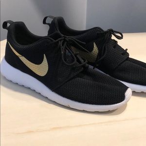 Nike Shoes - Black with gold Nike swoosh Nike Shoes - Black with gold Nike swoosh